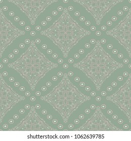 Geometric dark green seamless background wth pink elements. For fabrics and wallpapers