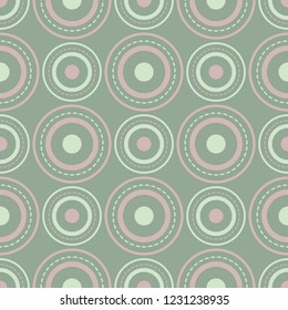 Geometric dark green seamless background wth pink elements. For fabrics and wallpapers
