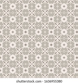 Geometric elegant pattern of flowers. Seamless vector background.silver and brown colors ornaments. Ornaments for fabrics, wallpapers, packaging, decorative printing,wall decoration