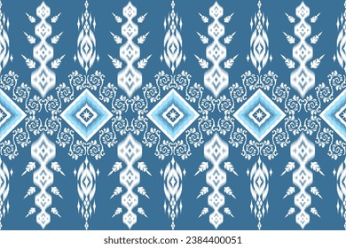 Geometric ethnic aztec embroidery style.Figure ikat oriental traditional art pattern.Design for ethnic background,wallpaper,fashion,clothing,wrapping,fabric,element,sarong,graphic,vector illustration.