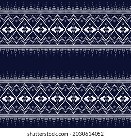 Geometric ethnic embroidery on dark blue background used in fashion and skirt,carpet,wallpaper,clothing,wrapping,Batik,fabric,sheet and wallpape design in Vector,illustration.eps