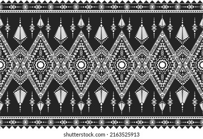 Patrón geométrico étnico ikat sin fisuras Diseño tradicional para el fondo,Hermosa figura tribal Patrón geométrico ucraniano geométrico étnico tradicional sobre el fondo negro, alfombra, papel pintado,