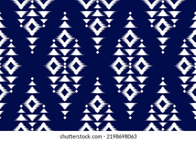 Geometric ethnic ikat seamless pattern in tribal. Design for background, wallpaper, illustration, fabric, clothing, carpet, textile, batik, embroidery.