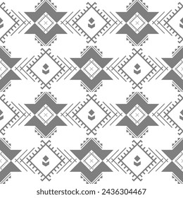 Geometric ethnic ikat seamless pattern. Embroidery style. Design for printed, clothing, fabric, fashion and wallpaper.