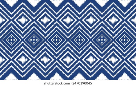 Diseño abstracto sin fisuras del patrón azul marino étnico geométrico Ikat para las cortinas de la alfombra del vestido del paño de la impresión de la tela y el sarong azteca africano indonesio .