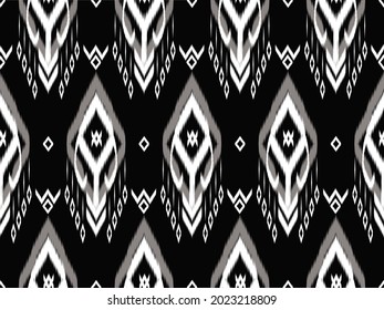 Geometric ethnic oriental ikat pattern traditional Design for background,wallpaper,surface,texture,clothing,fabric,carpet,wrapping.embroidery style.Vector illustration