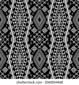 Geometric ethnic oriental seamless pattern art traditional black and white tone. Design for background,carpet,wallpaper,clothing,wrapping,Batik,fabric,Vector illustration.embroidery style.