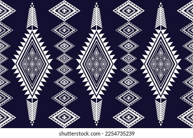 Geometría étnica oriental tradicional con triángulos y elementos sin fisuras. Fondo azul marino diseñado para fondo, papel pintado, ropa, envoltura, tela, Batik, decoración, bordado