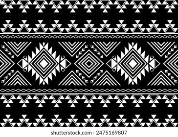 Geometric ethnic pattern in black white tones featuring American Indian and Aztec Navajo motifs. Ideal for backgrounds, carpets, wallpapers, clothing, wrapping, batik, and fabrics