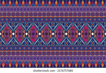 Geometric ethnic pattern oriental design on dark midnight navy background. Traditional geometry abstract with pink, white, yellow, green color for wallpaper handcraft, carpet, clothing, fabric design.