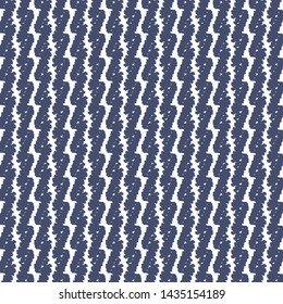 Geometric ethnic pattern with wavy or zigzag stripes. Decorative background in dark blue and white. Textile print. Wallpaper. Vector illustration.