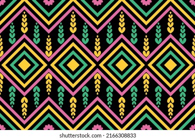 Geometric ethnic seamless pattern designed for background, wallpaper, traditional clothing, carpet, curtain, and home decoration. 