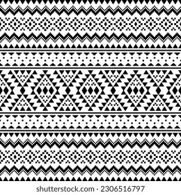 Geometric ethnic seamless pattern in Native American style. Pixel pattern with tribal Aztec motives in black and white color. Design for textile, fabric, clothing, curtain, rug, ornament, wallpaper.