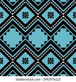 Geometric ethnic seamless pattern on blue background for fashion print, wallpaper, gift wrapping paper etc.