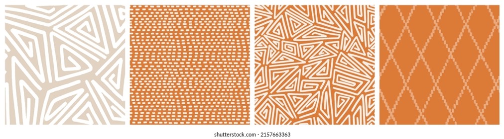 Geometric ethnic seamless pattern set in warm earth tones. Terracotta orange and sand beige triangle maze, diamond and strokes vector designs.