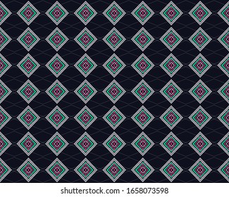 Geometric ethnic seamless pattern traditional design on dark navy background. Oriental multi-color geometry abstract with pink, green, white, line for wallpaper, handcraft, carpet, fabric, wrapping.