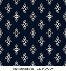 Patrón geométrico étnico sin fisuras Diseño tradicional para fondo, papel pintado, alfombra, ropa, Batik, tela, envoltura,Estilo de bordado de ilustración vectorial.