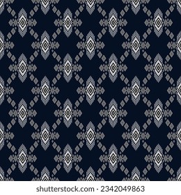 Geometric ethnic seamless pattern traditional Design for background,wallpaper,carpet,clothing,Batik,fabric,wrapping,Vector illustration embroidery style.
