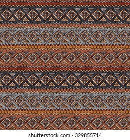 Geometric, ethnic, seamless pattern. Traditional folk structure, pattern of triangles, stripes, diamonds and zigzags, painted by hand.