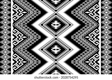 Geometric ethnic seamless pattern traditional.black and white tone. Design for background,carpet,wallpaper,clothing,wrapping,Batik,fabric,Vector illustration.embroidery style.