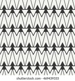Geometric ethnic tribal seamless pattern. Wrapping paper. Scrapbook. Doodles style. Tribal native vector illustration. Aztec background. Stylish graphic texture for design. Stripes. Black triangle