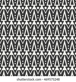 Geometric ethnic tribal seamless pattern. Wrapping paper. Scrapbook. Doodles style. Tribal native vector illustration. Aztec background. Stylish graphic texture for design. Stripes. Black triangle