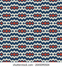 Patrón vectorial geométrico étnico. Ilustración tribal abstracta perfecta con zigzag rojo, azul y beige, líneas y formas. Diseño de vintage utilizado para la impresión de alfombras, papel de pared, textiles, embalaje