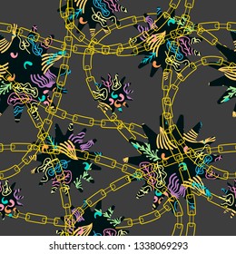 geometric figures with abstract flowers and golden chains on a dark gray color