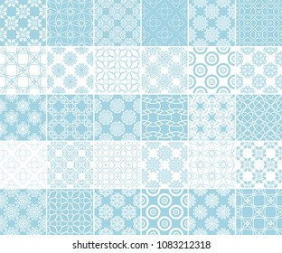 Geometric and floral collection of seamless patterns. Blue and white backgrounds for textile and wallpapers