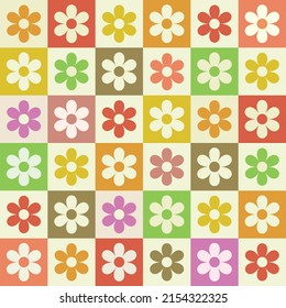 Geometric flowers seamless pattern on multicolored checkerboards. For textile, stationary and wrapping paper 