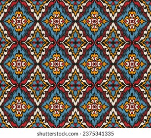 Geometric folk ornament ikat. Tribal ethnic vector textures. Seamless pattern in Aztec style. Folk embroidery. Indian, Scandinavian, Gypsy, Mexican rug. African carpet. Vector tie dye shibori print.