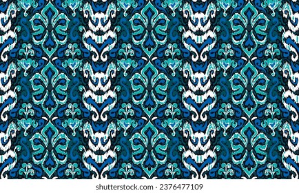 Geometric folk ornament ikat. Tribal ethnic vector textures. Seamless pattern in Aztec style. Folk embroidery. Indian, Scandinavian, Gypsy, Mexican, African carpet. Vector tie dye shibori print.