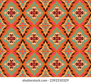 Geometric folk ornament ikat. Tribal ethnic vector textures. Seamless pattern in Aztec style. Folk embroidery. Indian, Scandinavian, Gypsy, Mexican rug. African carpet. Vector tie dye shibori print.