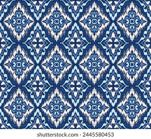 Geometric folk ornament ikat. Tribal ethnic vector textures. Seamless pattern in Aztec style. Folk embroidery. Indian, Scandinavian, Gypsy, Mexican rug. African carpet. Vector tie dye shibori print.