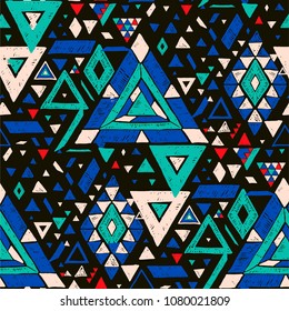 Geometric folklore hipster ornament with a triangle. Tribal ethnic vector embroidered texture. Seamless pattern in Aztec style. Japanese fabric.