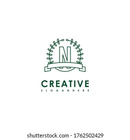 geometric green ornament N logo letter creative design concept