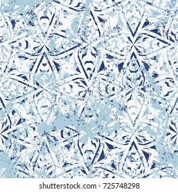 Geometric grunge pattern in blue colors on colorful hand painted background. Bold print with stripes and shapes on paint splatters and splashes. Vintage texture with ethnic and tribal motifs