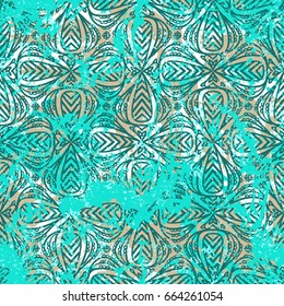 Geometric grunge pattern in bright colors on colorful hand painted background. Bold print with stripes and shapes on paint splatters and splashes. Vintage texture with ethnic and tribal motifs