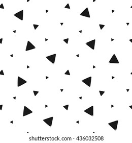 Geometric grunge seamless pattern of black triangle confetti on white background, hand drawn seamless background of trigon, vector design textile, wallpaper, wrapping, fabric, paper