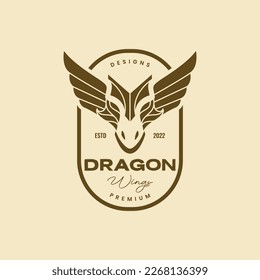 geometric head dragon ancient wings badge vintage simple logo design vector