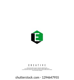 geometric hexagon black and green E logo letter design concept 