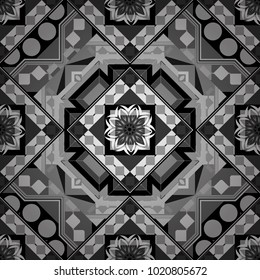 Geometric hipster tiles background. Abstract retro seamless pattern of geometric shapes. Colorful mosaic backdrop in white, gray and black colors. Vector illustration.