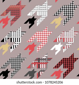 Geometric hounds tooth print. Large scale seamless pattern with checkered elements. Red, black, white, beige on grey background.