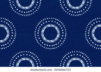 Geometric ikat seamless pattern. Ethnic traditional Japanese with fabric texture background.Asian tie dry indigo blue.Batic folk art design for wallpaper,fashion,surface,textile, print product,decor.