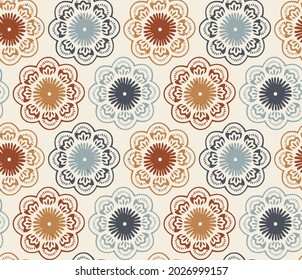 Geometric indian paisley pattern on half white background.Geometric seamless pattern circular ornament. Vector multicolor mandalas in orange, blue and red colors.