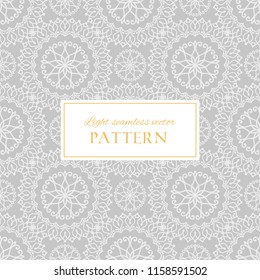 Geometric light grey ornate vector seamless pattern. Abstract texture with decorative hand drawn mandala elements. Elegant background for design and decor