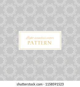 Geometric light grey ornate vector seamless pattern. Abstract texture with decorative hand drawn mandala elements. Elegant background for design and decor