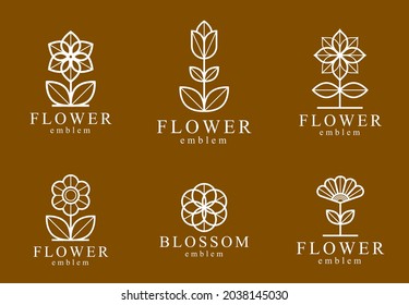 Logotipos o emblemas de flores vectoriales de estilo geométrico lineal, geometría sagrada, símbolos florales de línea colección de emblemas de dibujo, flor floral floreciente hotel o boutique o lotipos de joyería.