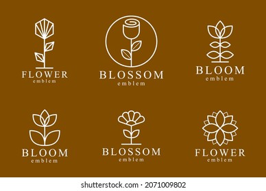 Geometric linear style vector flower logos or emblems set, sacred geometry floral symbols line drawing emblems collection, blossoming flower hotel or boutique or jewelry logotypes.