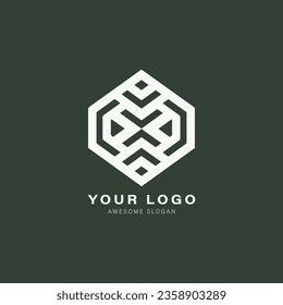 Geometric logo with a hexagonal shape in the center. The hexagon is made up of smaller hexagons that are connected to form a larger hexagon